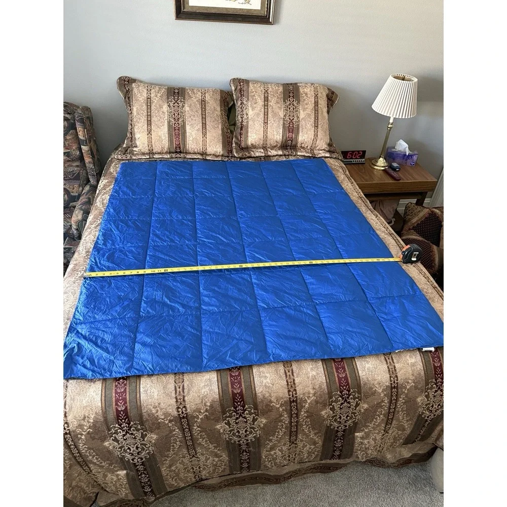 The BIG One Travel Puffer Throw in Travel Bag 60